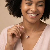 Thumbnail for Woman wearing Precious Name Necklace with personalized charm and birthstone crystal.