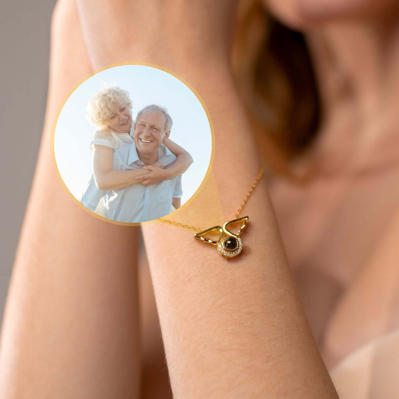 Angel Photo Bracelet featuring a personalized photo locket and elegant angel wing design by Brother & Sisters.