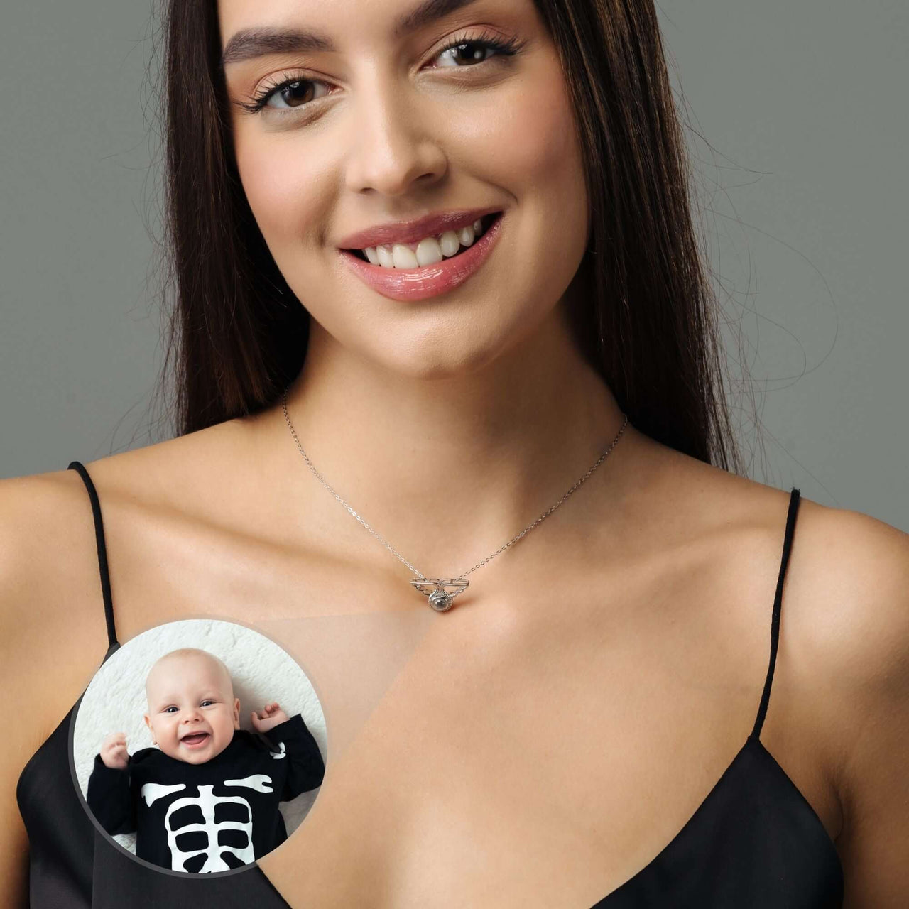 Angel Photo Necklace worn by a woman, showcasing angel wing design for remembrance, by Brother & Sisters.