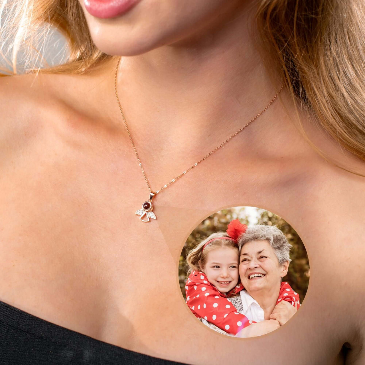 Angel Photo Necklace featuring a sentimental design with a photo projection of a grandmother and granddaughter.