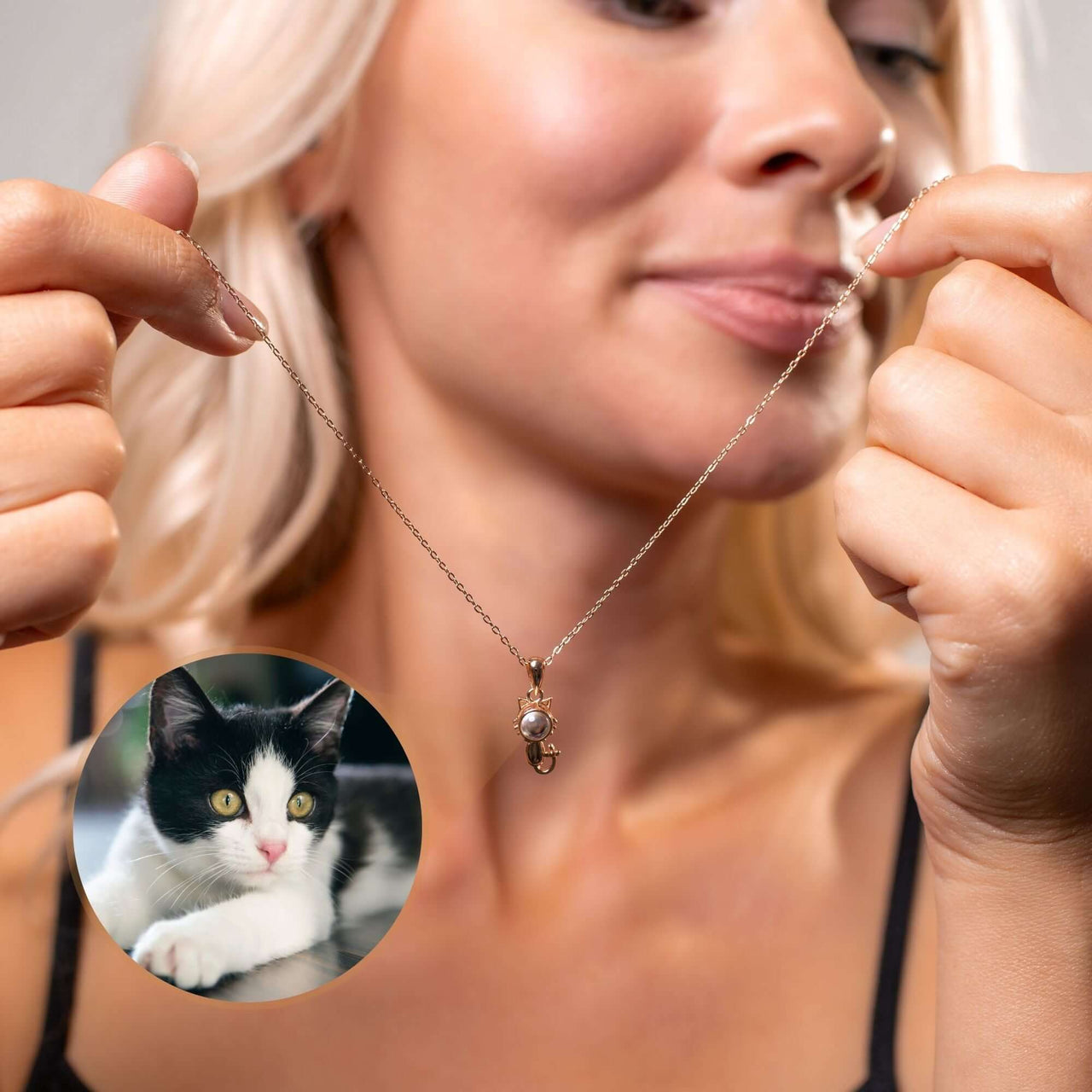 Woman showcasing an Animal Photo Necklace featuring a custom photo pendant of her cat, made by Brother & Sisters.
