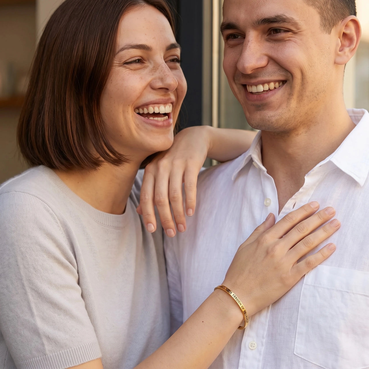 Couple moment, she wears the Be The Unique Version Of Yourself bracelet in gold | SKU: btuvoy-g