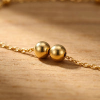 Thumbnail for Close-up of paired bead stations on the Beaded Station Anklet by Brother & Sisters, showcasing 18K gold-plated detail.