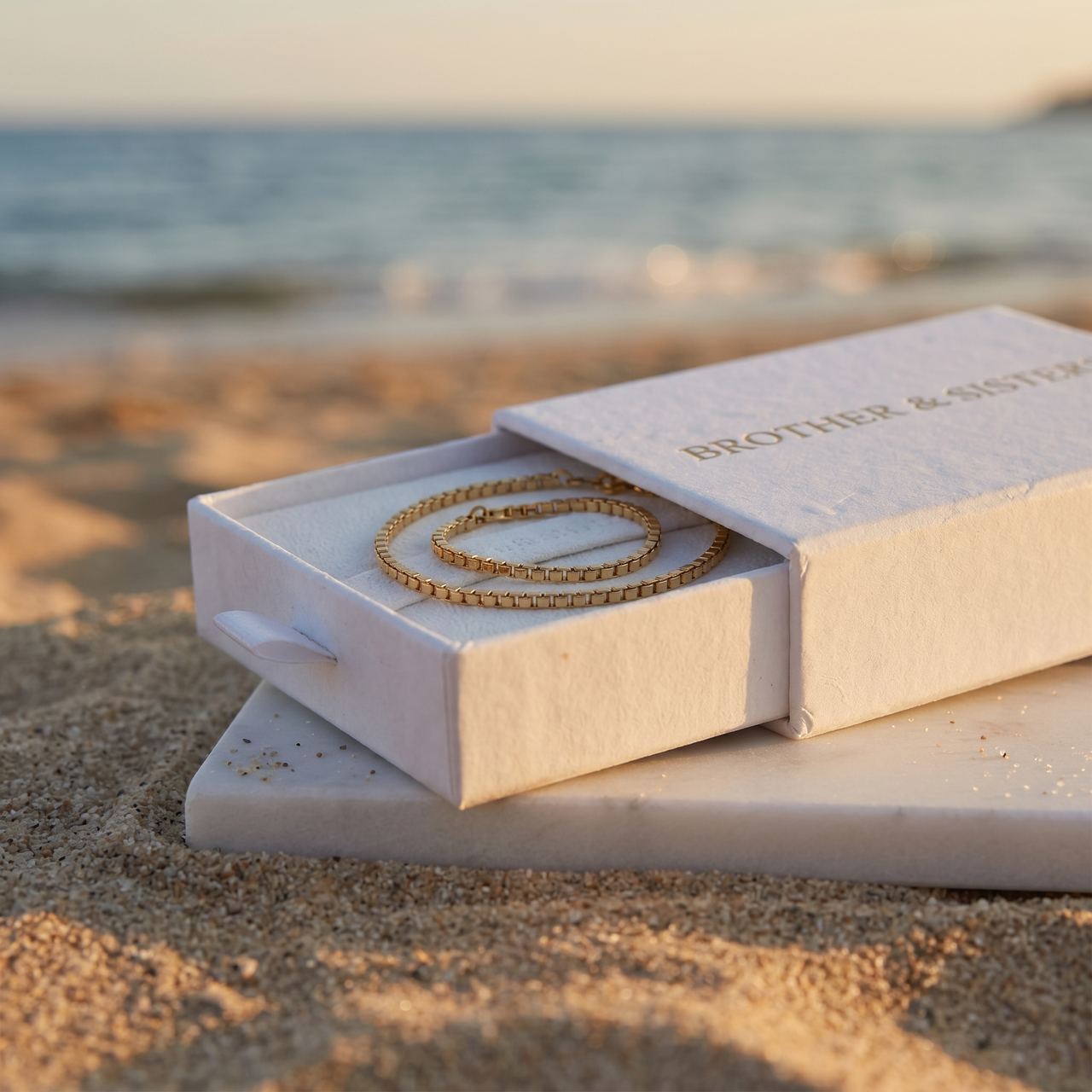 Box Chain Anklet in Brother & Sisters gift box on beach