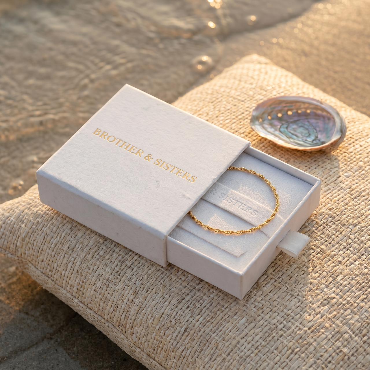 Singapore Twist Anklet in Brother & Sisters gift box on beach