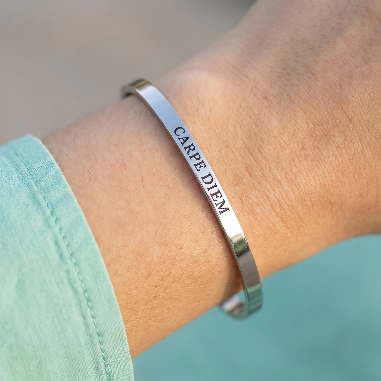 Close-up of the Carpe Diem bracelet in silver worn | SKU: cp-wg