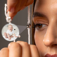 Thumbnail for Close-up of woman holding White Photo Bracelet showcasing personalized photo of baby, by Brother & Sisters.