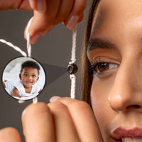 Thumbnail for Close-up of woman holding White Photo Bracelet with personalized photo pendant by Brother & Sisters.