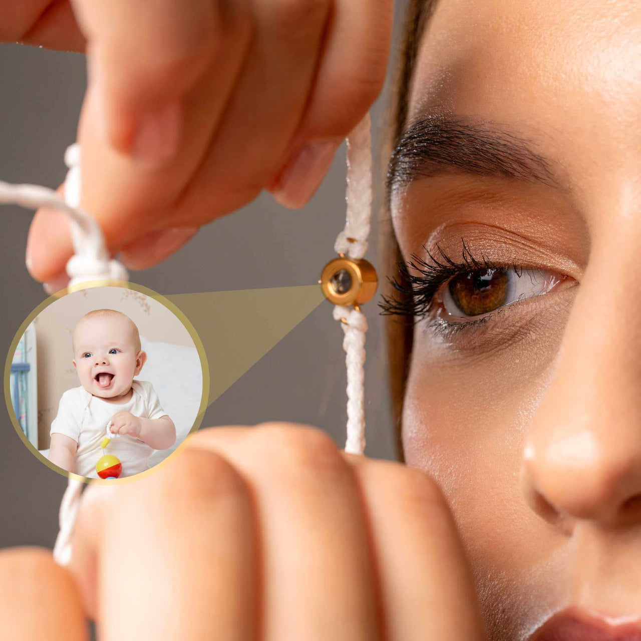 White Photo Bracelet with a personalized photo of a smiling baby on a woman's wrist, by Brother & Sisters.