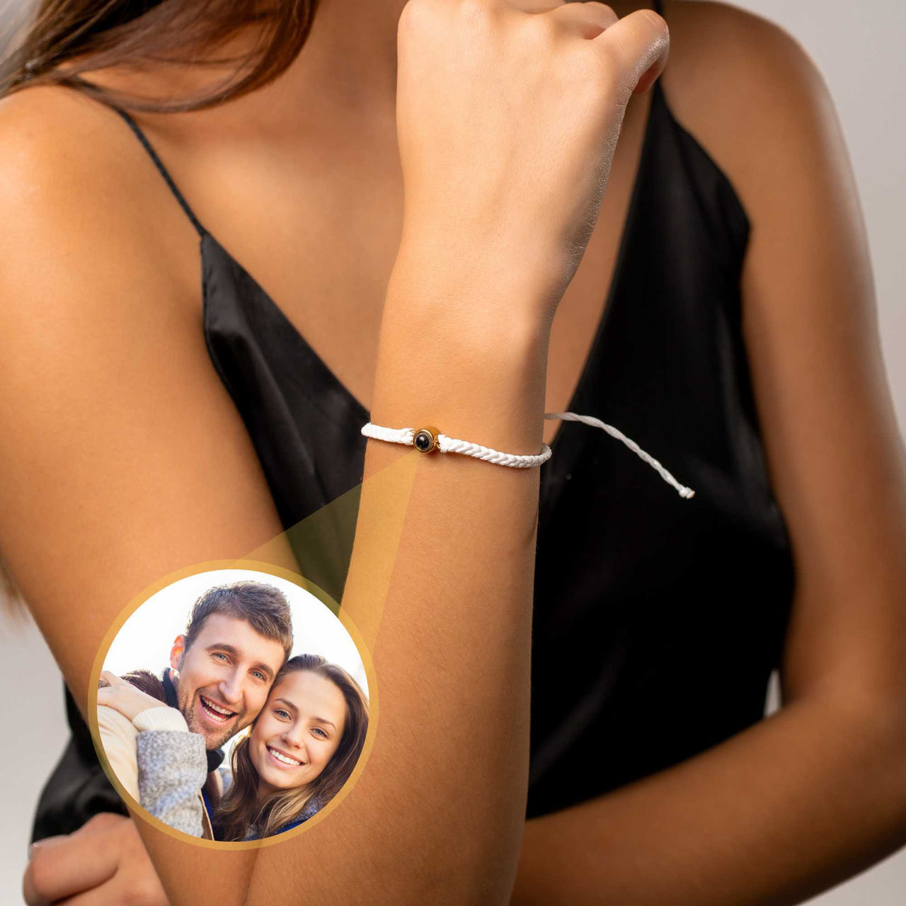 White Photo Bracelet worn on a woman's wrist featuring a personalized photo pendant by Brother & Sisters.