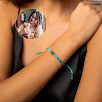 Thumbnail for Blue Photo Bracelet featuring a circular pendant with a personal photo and elegant turquoise braid from Brother & Sisters.