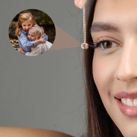 Thumbnail for Personalised Circle Necklace featuring a custom picture, showcasing a woman holding the pendant by Brother & Sisters.