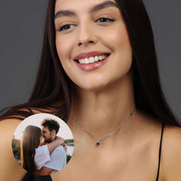 Thumbnail for Personalised Circle Necklace worn by a smiling woman, featuring a custom picture inside the pendant by Brother & Sisters.