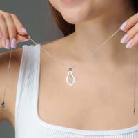 Thumbnail for Birth Flower Name Necklace showcased on a model, featuring personalized design by Brother & Sisters.