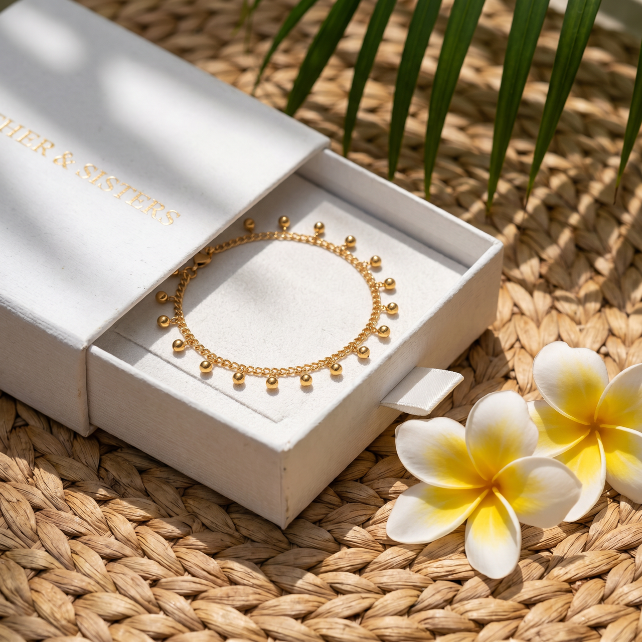 Drop Bead Anklet in a box by Brother & Sisters, featuring tiny gold beads for a shimmering summer-ready style.