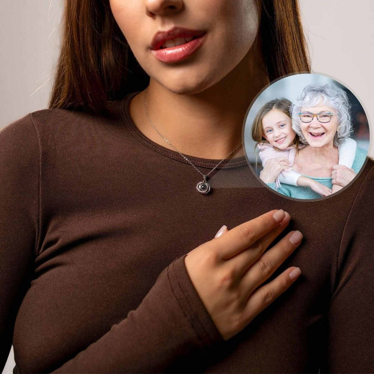 Duo Photo Necklace worn by a woman showcasing a photo of her loved ones, designed by Brother & Sisters.