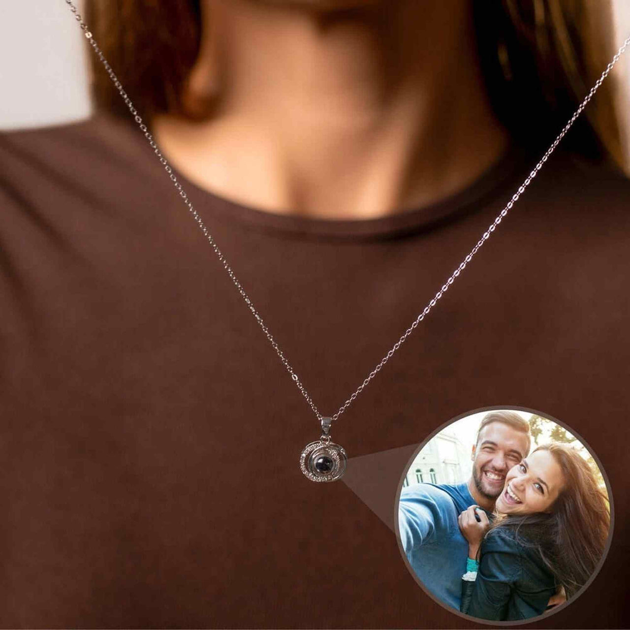 Duo Photo Necklace by Brother & Sisters featuring customizable projection pendant displaying a couple's photo.