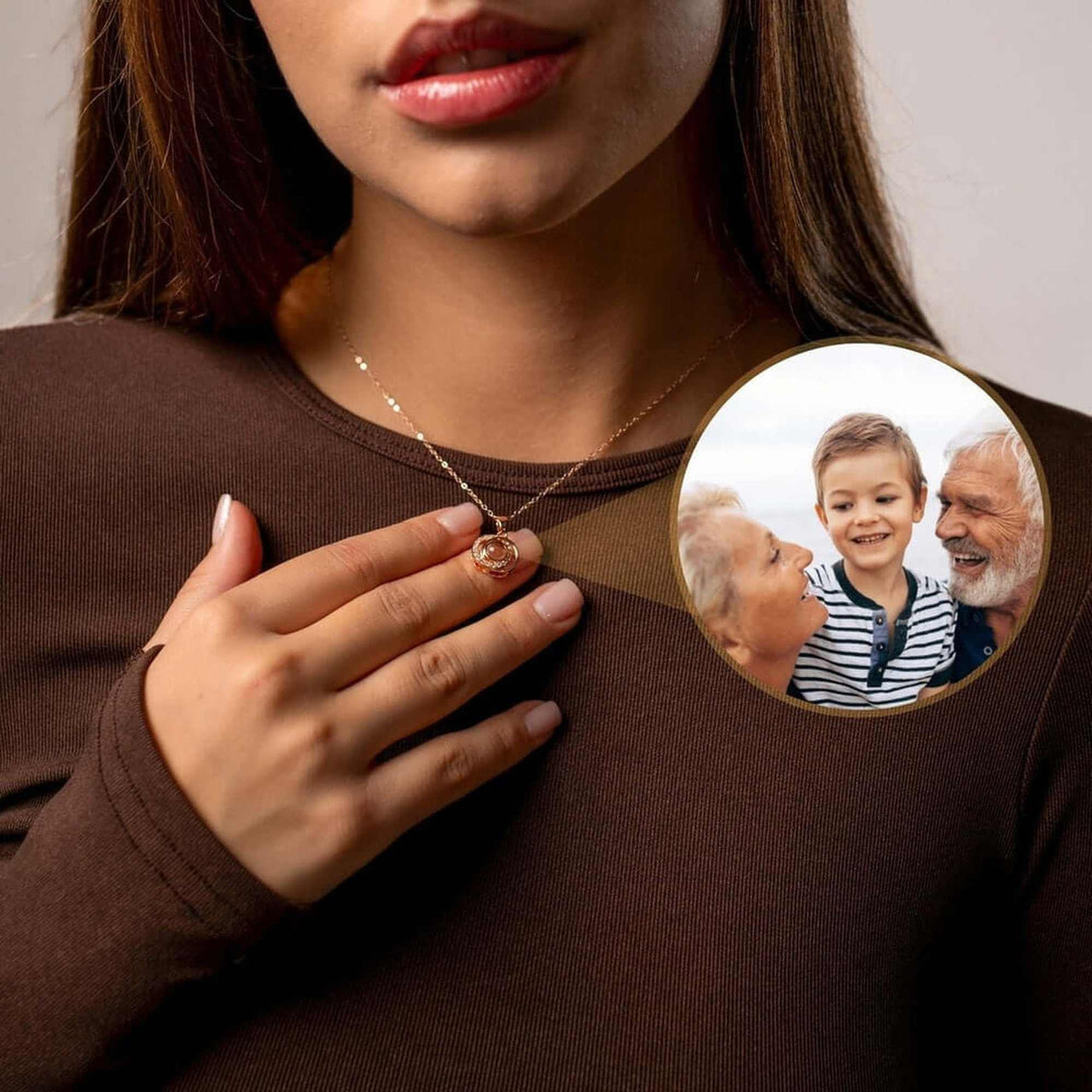 Duo Photo Necklace by Brother & Sisters featuring customizable projection of loved ones.