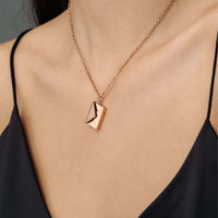 Thumbnail for Envelope Name Necklace by Brother & Sisters worn as a chic accessory, blending elegance with personalization.
