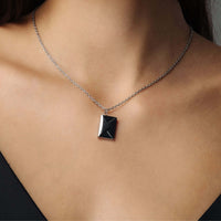 Thumbnail for Envelope Name Necklace by Brother & Sisters, featuring a sleek engraved envelope pendant on a silver chain.