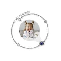 Thumbnail for Eternity Photo Bracelet featuring a photo of a smiling child, designed by Brother & Sisters to hold cherished memories.