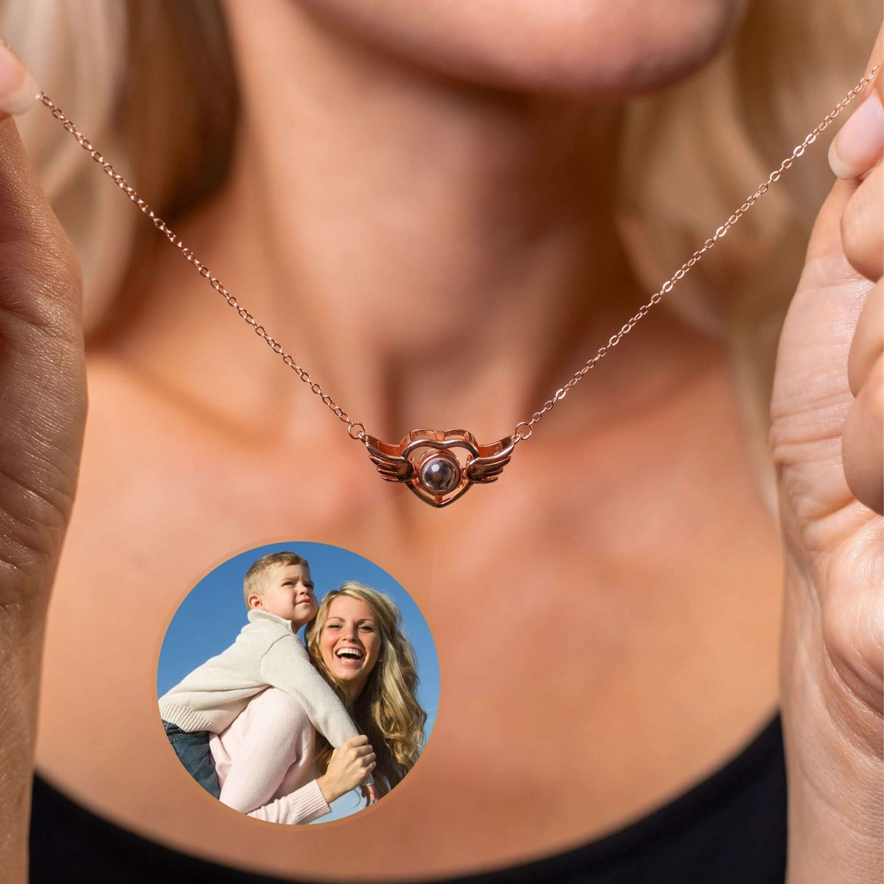 Flying Heart Photo Necklace with wings, showcasing a custom photo, by Brother & Sisters.