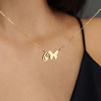 Thumbnail for Butterfly Initial Necklace by Brother & Sisters featuring a gold butterfly charm and custom initial pendant.