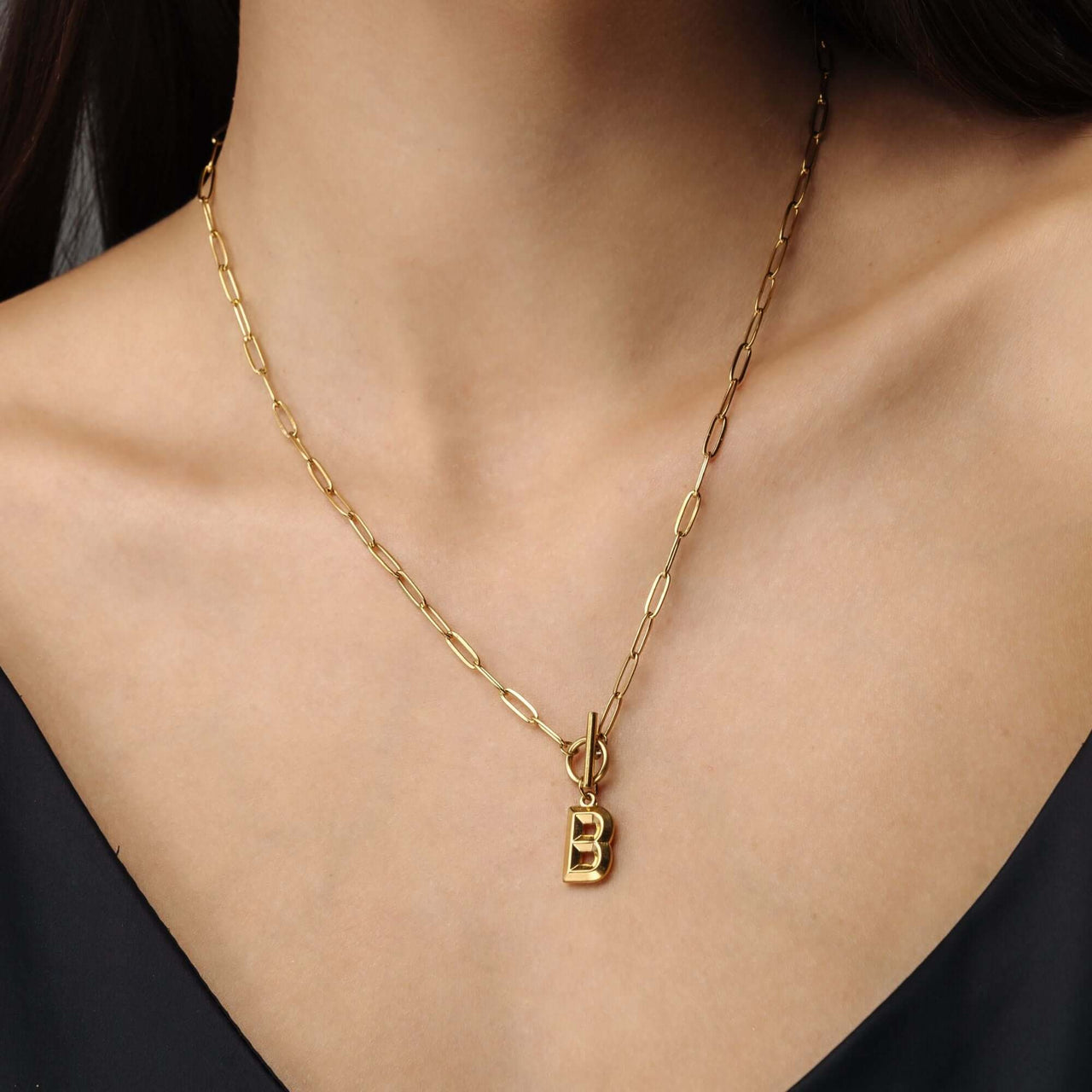 Chain Initial Necklace by Brother & Sisters featuring a gold initial pendant and delicate chain.