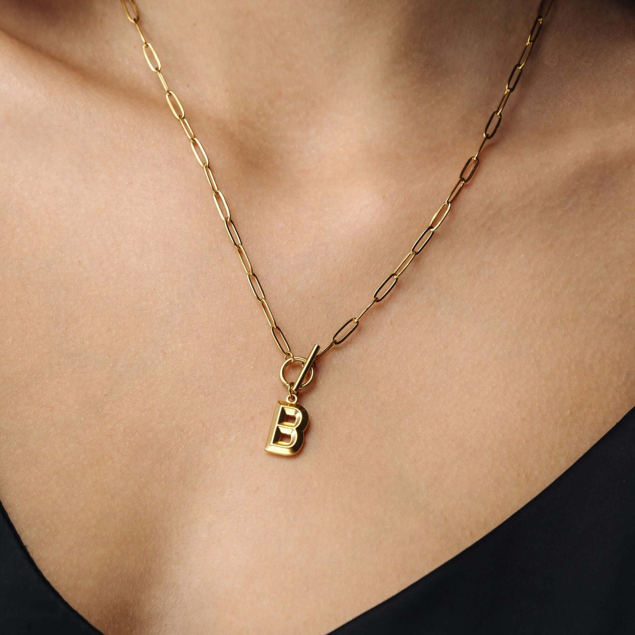 Chain Initial Necklace by Brother & Sisters featuring a gold letter 'B' pendant on a delicate chain.