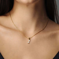Thumbnail for Hope Initial Necklace with letter J in gold chain worn by a woman, elegant and personalized jewelry from Brother & Sisters.