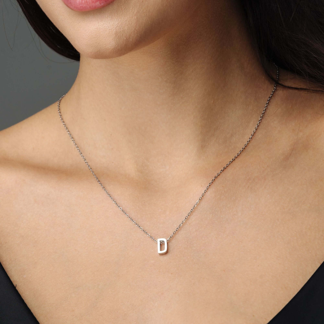 Iconic Initial Necklace by Brother & Sisters featuring a polished letter 'D', gold necklace for personalized elegance.