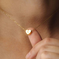 Thumbnail for Love Initial Necklace by Brother & Sisters featuring a gold heart charm with initial E.