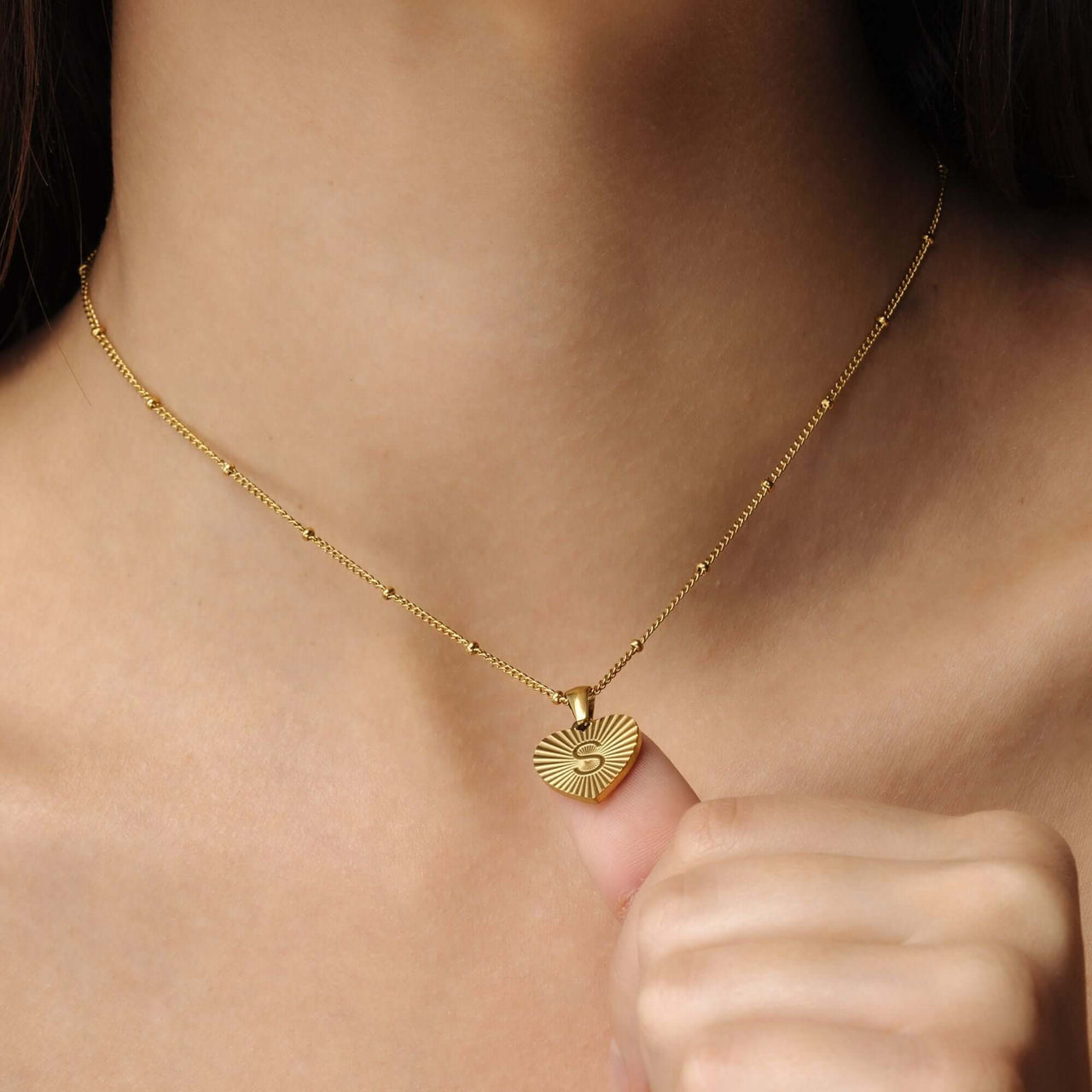 Sentimental Initial Necklace by Brother & Sisters, a gold necklace for women showcasing an elegant letter S pendant.