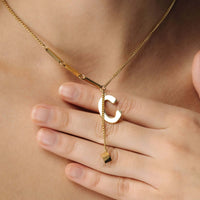 Thumbnail for Simple Initial Necklace by Brother & Sisters - Elegant gold necklace featuring a personalized initial charm.