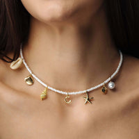 Thumbnail for Summer Initial Necklace by Brother & Sisters with ocean-inspired charms and pearl accents for beachy elegance.