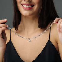 Thumbnail for Trendy Initial Necklace worn by a woman, featuring personalized gold elegance by Brother & Sisters.