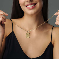 Thumbnail for Vintage Initial Necklace worn by a woman, featuring a delicate letter charm and a gold chain from Brother & Sisters.