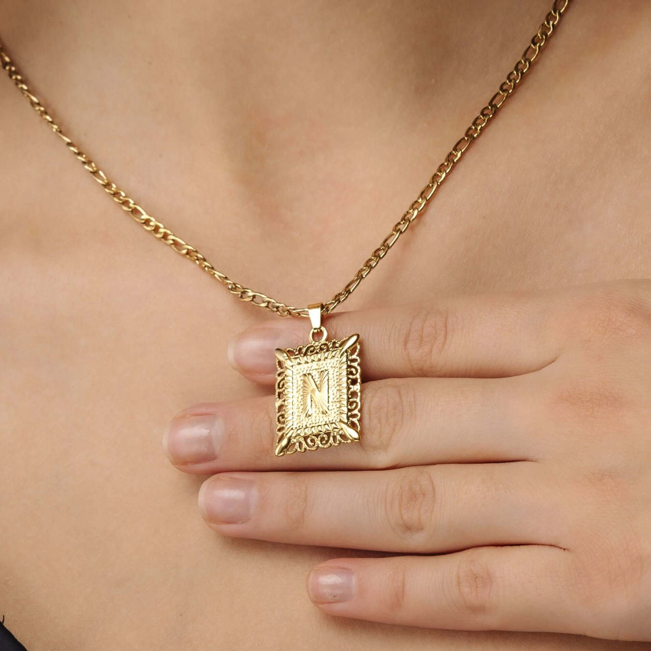 Vintage Initial Necklace featuring a gold letter charm, crafted by Brother & Sisters, perfect for a personalized style.