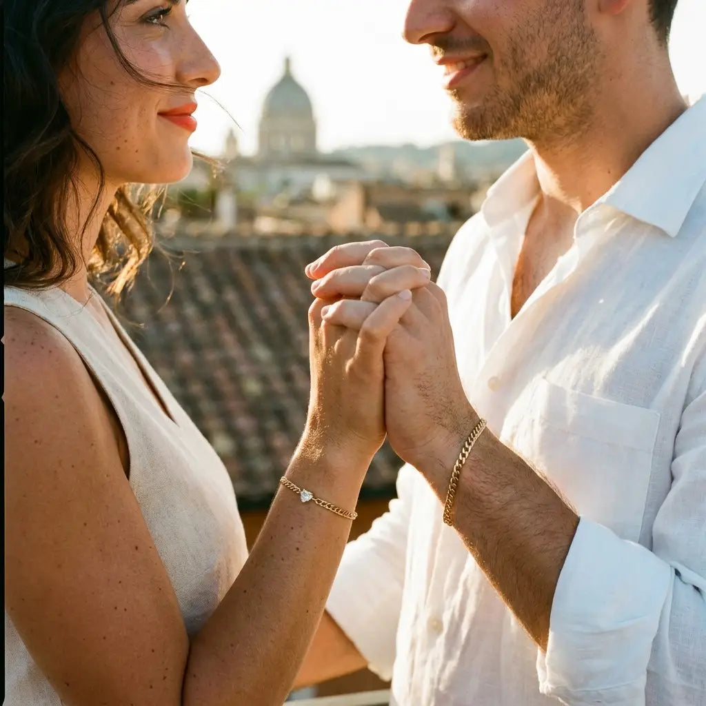 Italian couple wearing matching gold Heart Bond bracelets, Rome golden hour