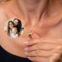 Thumbnail for Horn Photo Necklace worn by a woman, featuring a personalized photo pendant by Brother & Sisters.
