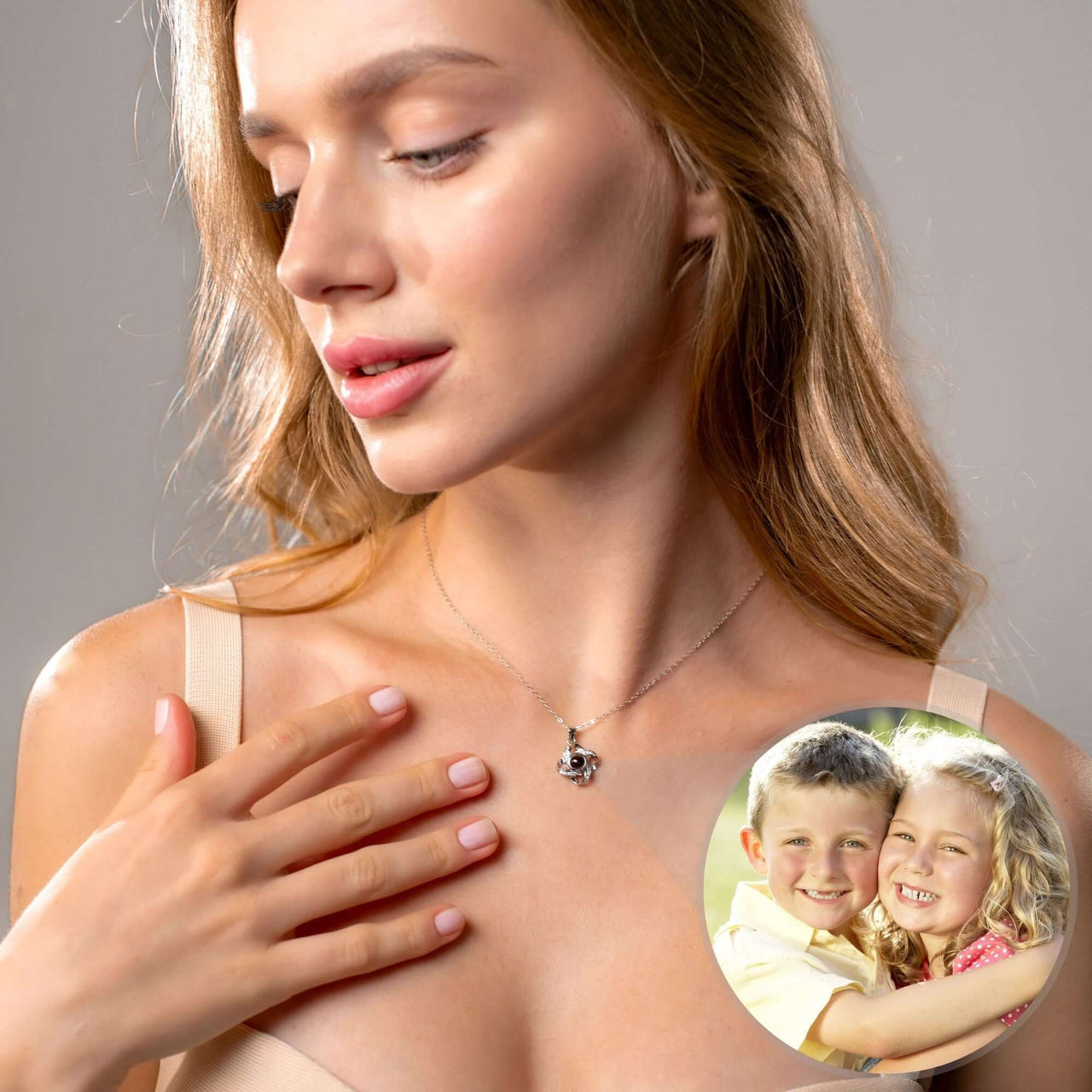 Model wearing the Infinite Photo Necklace by Brother & Sisters, showcasing a personalized photo projection.