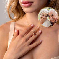Thumbnail for Woman wearing Infinite Photo Necklace by Brother & Sisters, featuring a cherished photo projection of loved ones.