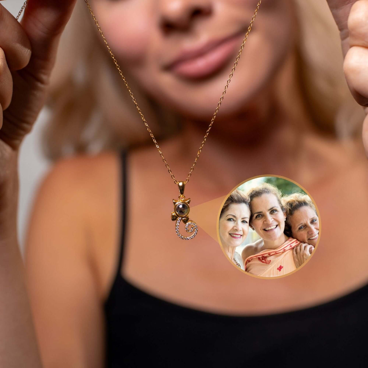 Kitten Photo Necklace worn by a woman, featuring a picture locket that personalizes cherished memories.
