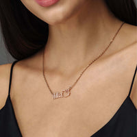 Thumbnail for Kitty Name Necklace worn by a model featuring personalized name 'Mia' with a chic design by Brother & Sisters.