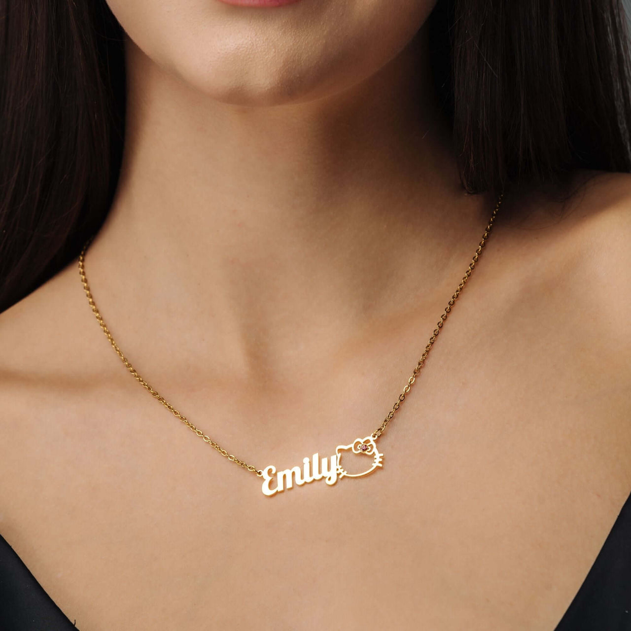 Kitty Name Necklace featuring the name Emily in gold, elegant personalized jewelry by Brother & Sisters.