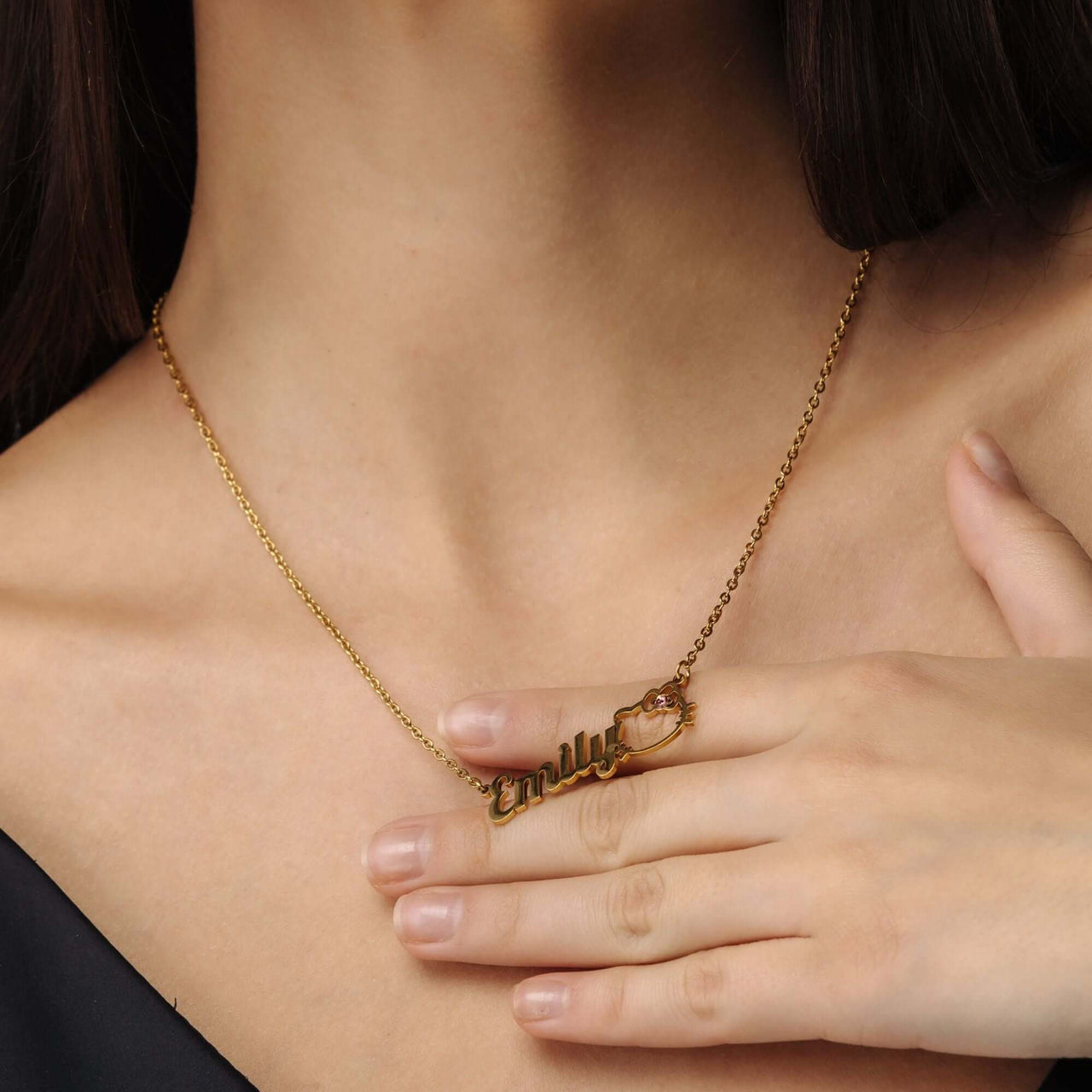 Kitty Name Necklace featuring the name 'Emily' in elegant gold design by Brother & Sisters.