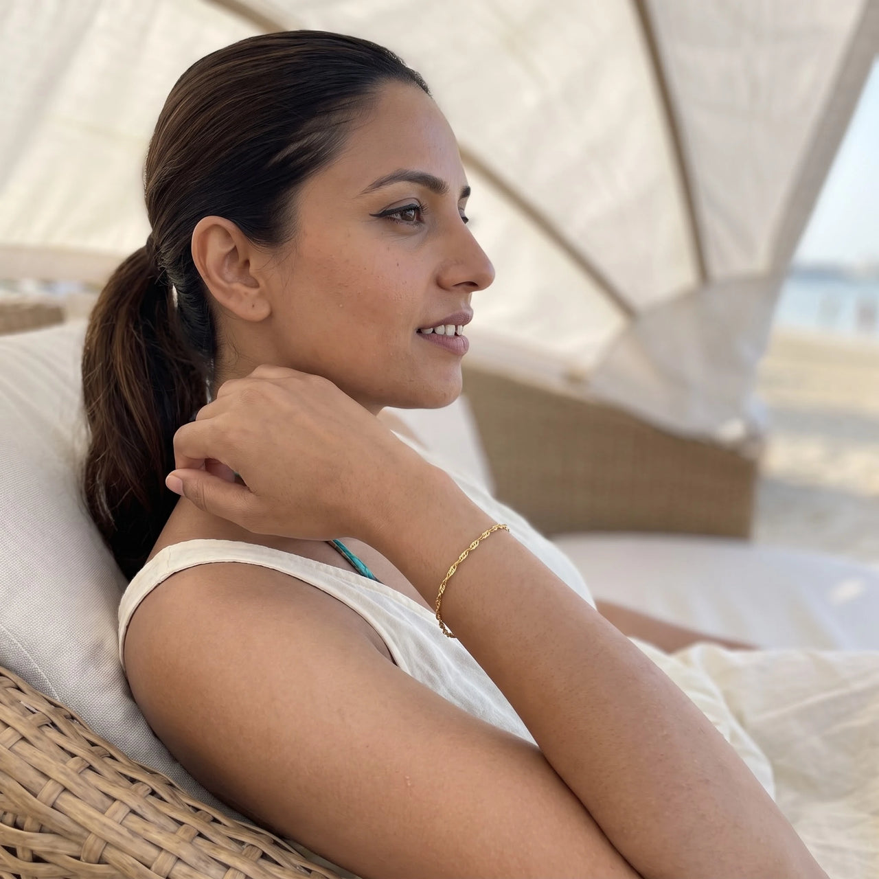 The Finesse bracelet in gold worn during a relaxed moment | SKU: lafinesse