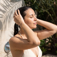Thumbnail for The Finesse bracelet in gold worn in an outdoor shower | SKU: lafinesse