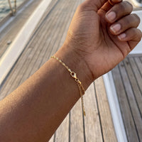 Thumbnail for The Finesse bracelet in gold worn, showing its real size | SKU: lafinesse