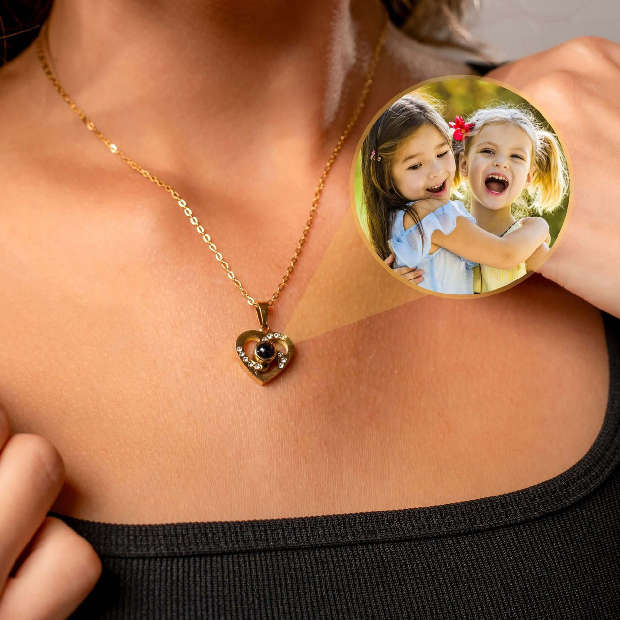 Love Photo Necklace worn by a model, showcasing a heart pendant with a cherished photo inside by Brother & Sisters.